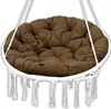 A round, tufted cushion in a brown fabric, designed for a hanging chair or swing, with white macrame fringe around the edge. Produktbild-Vorschau
