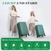 A woman and a child stand with two dark green suitcases. Produktbild-Vorschau