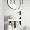 A bathroom sink with a black faucet and a wooden shelf mounted on a tiled wall. Náhľad obrázku produktu