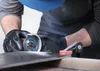 A person is using an angle grinder to cut a piece of material. Produktbild-Vorschau
