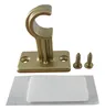 A set of curtain rod brackets and screws on a white background. Produktbild-Vorschau