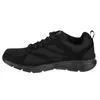 A side view of a black Skechers shoe. Náhľad obrázku produktu