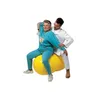 An elderly woman is doing physical therapy on a large yellow exercise ball, assisted by a physical therapist. Produktbild-Vorschau