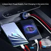 A car's interior console with two smartphones being charged by a car charger. Produktbild-Vorschau