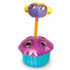 A toy pencil sharpener shaped like a cupcake with a monkey head on top. Produktbild-Vorschau