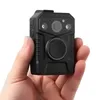 A hand holds a black body camera. Produktbild-Vorschau