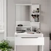 A white vanity table with a mirror and various makeup accessories. Produktbild-Vorschau