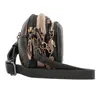 A small, multi-compartment handbag with decorative charms. Anteprima dell’immagine prodotto