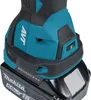 Close-up of the base of a Makita cordless multitool, showing the battery pack and part of the tool's body. Produktbild-Vorschau