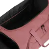 Close-up view of the interior and exterior of a pink duffel bag. Produktbild-Vorschau
