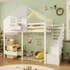 A child's bedroom with a white house-shaped loft bed decorated for Christmas. Anteprima dell’immagine prodotto