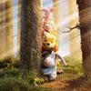 Winnie the Pooh characters stacked up against a tree in a forest. Produktbild-Vorschau