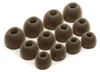 A collection of brown silicone ear tips for headphones, arranged in rows on a white background.
