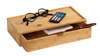 A bamboo storage box with a drawer, containing glasses, a remote control, a stack of cards, and a pen. Náhľad obrázku produktu