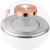 A close-up view of the lid of a white electric kettle, highlighting the handle and its copper-colored top. Produktbild-Vorschau
