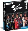 The image shows the front of a board game box for MotoGP, featuring five motorcycle racers in their racing suits. Podgląd zdjęcia produktu