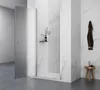 A modern bathroom with a glass shower enclosure and a towel hanging on the wall. Anteprima dell’immagine prodotto
