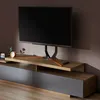 A TV stand with a TV mounted on it, placed in a room. Náhled obrázku produktu