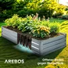 A raised garden bed filled with plants, with a cutaway showing the soil and drainage. Produktbild-Vorschau