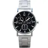 A close-up, front-facing studio shot of a silver and black analog wristwatch with multiple subdials. Produktbild-Vorschau