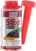 A can of Liqui Moly Diesel Russ-Stop additive with a red funnel next to it. Produktbild-Vorschau