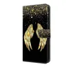 A black flip-style phone case with a gold wing design and gold glitter accents. Produktbild-Vorschau