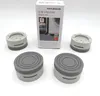 A set of four anti-vibration pads for appliances, along with their packaging, are displayed on a white background. Anteprima dell’immagine prodotto