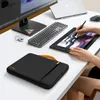 A desk setup with a laptop, monitor, keyboard, drawing tablet, and a laptop sleeve. Anteprima dell’immagine prodotto