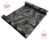 A roll of wallpaper with a geometric pattern is displayed on a white background. Anteprima dell’immagine prodotto