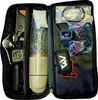 An open black case containing various accessories and a central cylindrical device, likely a power fin or motor for a watercraft. Podgląd zdjęcia produktu