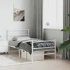 A white metal bed frame with a mattress and bedding is shown in a bedroom setting. Náhled obrázku produktu