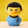 A plush toy duck dressed as Spock from Star Trek, set against a yellow background. Voir les images du produit
