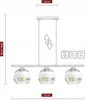 A product image showing a white pendant light with three glass globes, with dimensions indicated. Podgląd zdjęcia produktu
