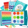 An open educational book displaying colorful fraction manipulatives and learning materials. Náhľad obrázku produktu