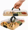A hand is shown lifting the lid off a serving tray filled with sushi, and then a close-up of the tray with sushi is shown. Produktbild-Vorschau