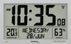 A digital clock displaying time, date, temperature, and humidity. Voir les images du produit