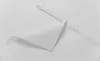 A close-up of a white fabric panel with a white metal rod attached to the top and a strip of velcro along the bottom edge. Produktbild-Vorschau