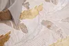 A close-up view of a rug with a leaf pattern. Anteprima dell’immagine prodotto