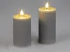 Two LED candles with a ribbed texture and a flickering flame. Produktbild-Vorschau