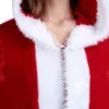 Close-up of a person wearing a red and white hooded cape. Anteprima dell’immagine prodotto