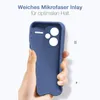 A hand holding a blue phone case against a white background. Produktbild-Vorschau
