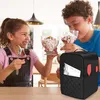 Two children are enjoying ice cream, with a black storage bag for an ice cream maker in the foreground. Produktbild-Vorschau