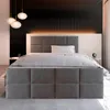 A modern bedroom with a bed as the central focus. Produktbild-Vorschau