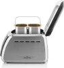 A silver bread maker with its lid open, showing two baking molds inside. Podgląd zdjęcia produktu