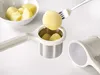 A potato masher with cooked potatoes being prepared. Anteprima dell’immagine prodotto