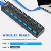 A USB hub with multiple ports and blue LED lights is shown connected to a laptop. Produktbild-Vorschau