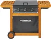 A Campingaz grill cart with wooden accents and a black fabric cover. Produktbild-Vorschau