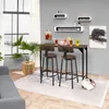 A bar set with two stools in a modern living room setting. Náhled obrázku produktu