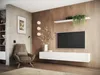 A modern living room with a TV mounted on a wooden wall, a floating media console, and a comfortable armchair. Produktbild-Vorschau