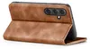 A brown leather flip case for a smartphone is shown from a side-angle, with the phone inserted and the front cover open. Produktbild-Vorschau